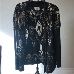 Gray and white lucky sweater